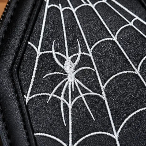 Detail der Spinnennetz Stickerei