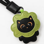 Detailansicht des grünen Katzen Taschenanhängers