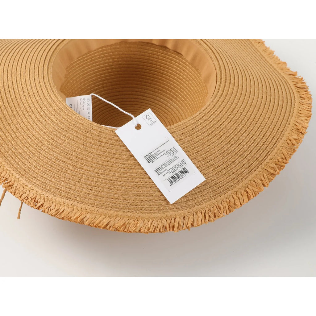 Innenansicht und Produktetikett des khakifarbenen Boho Strohhuts