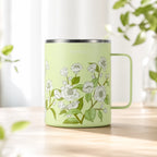 Grüner floraler Isolierbecher als Produktansicht