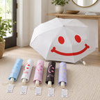 Happy Mood Automatik Taschenschirme in einer hellen Eingangsszene