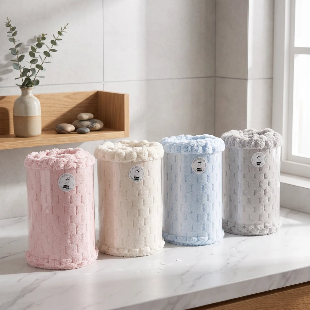 Vier Farbvarianten des MUMUSO Macaron Oversize-Badetuchs