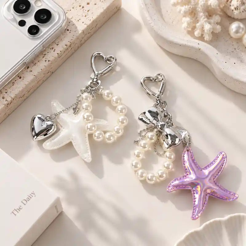 Sea Pearl Handy Anhänger mit Perlen, Herz, Schleife und Seestern