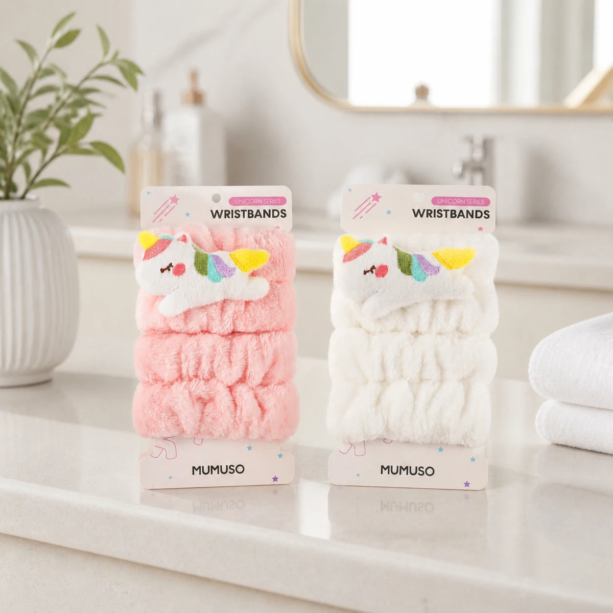 Unicorn Wascharmbänder in Rosa und Weiß im Badezimmer