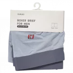 Rückseite der mumuso herren boxer-shorts in grau mit verpackung.