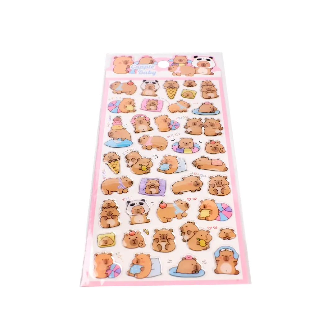 mumuso_crystal_sticker_capybara_pvc_epoxidharz_mehrfarbig_3.webp MUMUSO Crystal Sticker mit Capybara aus PVC und Epoxidharz, mehrfarbig – lustige Capybara Sticker für Kinder und Deko.