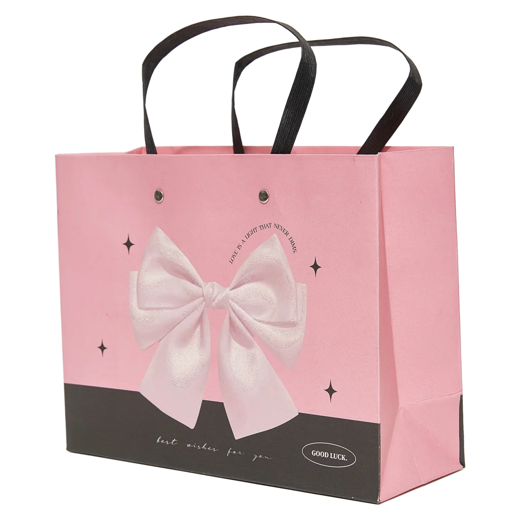 mumuso_geschenktasche_papier_klein_rosa_schleife_2.webp MUMUSO Geschenktasche aus Papier klein, rosa, mit Schleife – stilvoller Geschenkbeutel für Präsente und kleine Aufmerksamkeiten.